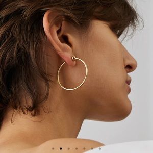 Jenny Bird gold Icon Hoops in small (~1.5 inches)